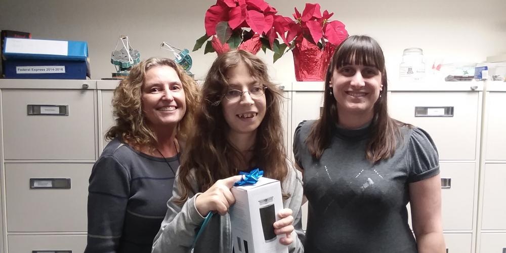 student given Christmas gift by two internship supervisors