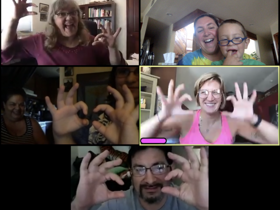 screen shot of zoom PCP meeting with everyone giving the wildcat hand symbol