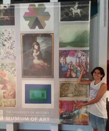 student at UArizona Museum of Art showcasing a poster